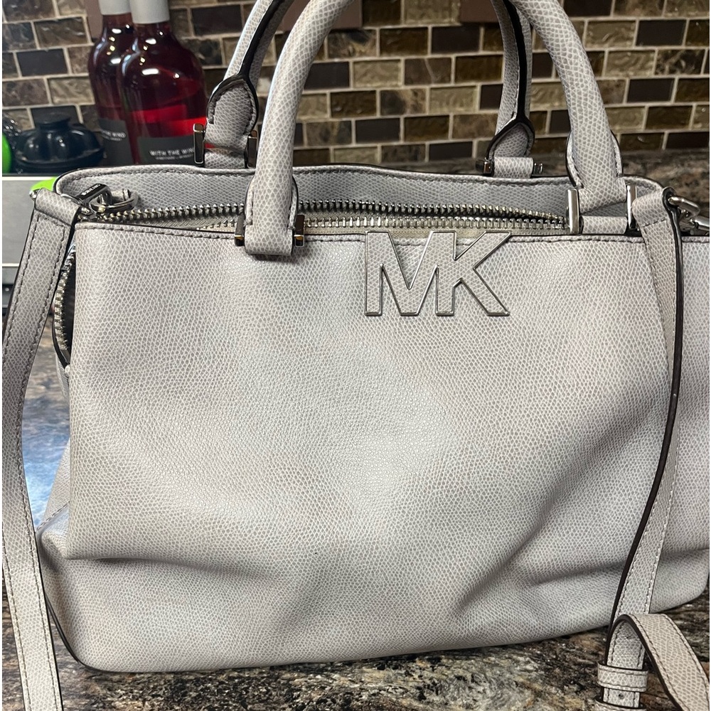 Michael Kors purse like new 16” long by 8 high and very wide and deep
